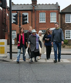 Lynne Featherstone crossing North Hill with Highgate councillors Bob Hare and Rachel Allison plus local pensioners