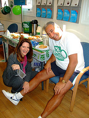 Lynne Featherstone waxing Steve Kalli's legs at Barclays Muswell Hill