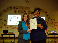 Lynne Featherstone MP presenting 5E student Rachel Williams with certificate of achievement 