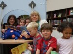 Lynne and Gail reading with children at Muswell Hill Library