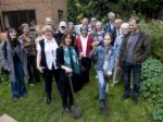 Lynne Featherstone planting trees with residents
