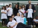 Lynne Featherstone MP and Jonny Gould with students at the new games area at TreeHouse