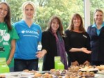 Lynne Featherstone MP (Centre) with Barclays and Macmillan staff in Barclays, Wood Green