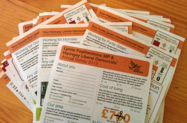 a pile of the MP’s annual surveys