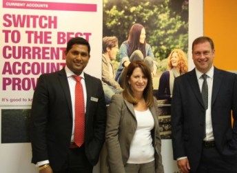 Lynne Featherstone with Bhanu Raghav Kuppala, the branch manager and local area manager David Whitehead