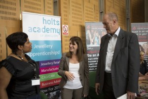 Lynne Featherstone MP  with Gordon Birtwistle MP, talking to an organisation representative at the Haringey Apprenticeship event