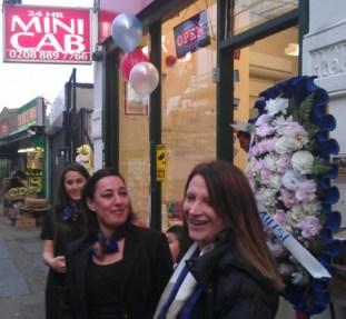Lynne Featherstone MP with Sales and Marketing Manager Ayse Guner outside On Time Cars at the opening