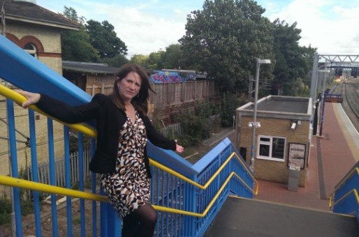 Lynne Featherstone MP demonstrates the accessibility problem at Alexandra Palace Stati