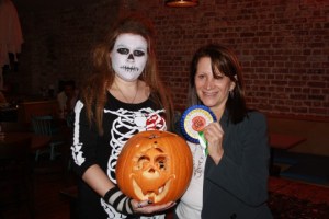 Lynne Featherstone gives out rosettes for the best carved pumpkins